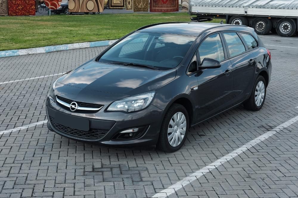 Опель универсал 2012. Opel Astra универсал 2014. Opel Astra 2014. Opel Astra 2013 универсал.